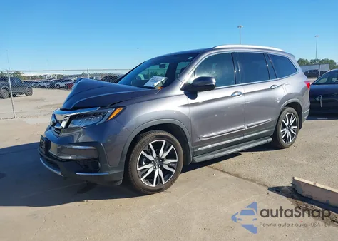 2020 Honda Pilot 2Wd Touring 8 Passenger z USA, uszkodzony, nr VIN 5FNYF5H97LB007227